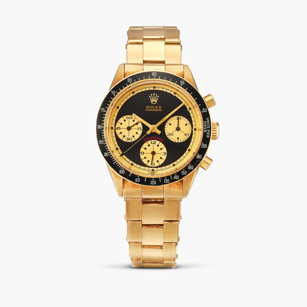 View full screen - View 1 of Lot 2400. Cosmograph Daytona 'Paul Newman John Player Special Cherry', Reference 6264 | A yellow gold chronograph wristwatch with bracelet, Circa 1971.
