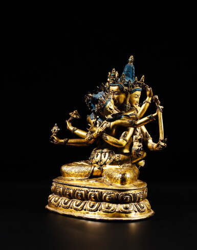 View full screen - View 1 of Lot 16. A rare turquoise-inlaid gilt-copper alloy figure of Guhyasamaja, Tibet, 15th century | 十五世紀 藏傳銅鎏金嵌寶密集金剛坐像.