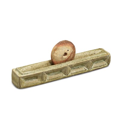 View full screen - View 1 of Lot 5004. A rare green-glazed tea mortar, Tang - Five dynasties 唐至五代 青釉茶碾.