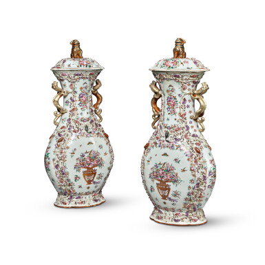 View full screen - View 1 of Lot 12. A Pair of Chinese Export Famille-Rose Baluster Vases and Covers, Qing Dynasty, Qianlong Period, Circa 1785 | 清乾隆 約1785年 粉彩松鼠葡萄浮雕花籃圖龍耳蓋瓶一對.