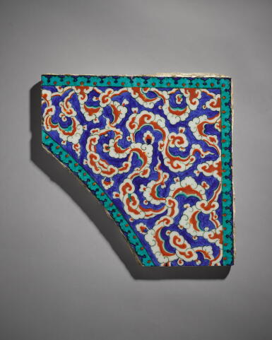 View full screen - View 1 of Lot 662. An Iznik polychrome pottery tile spandrel, Turkey, circa 1580.