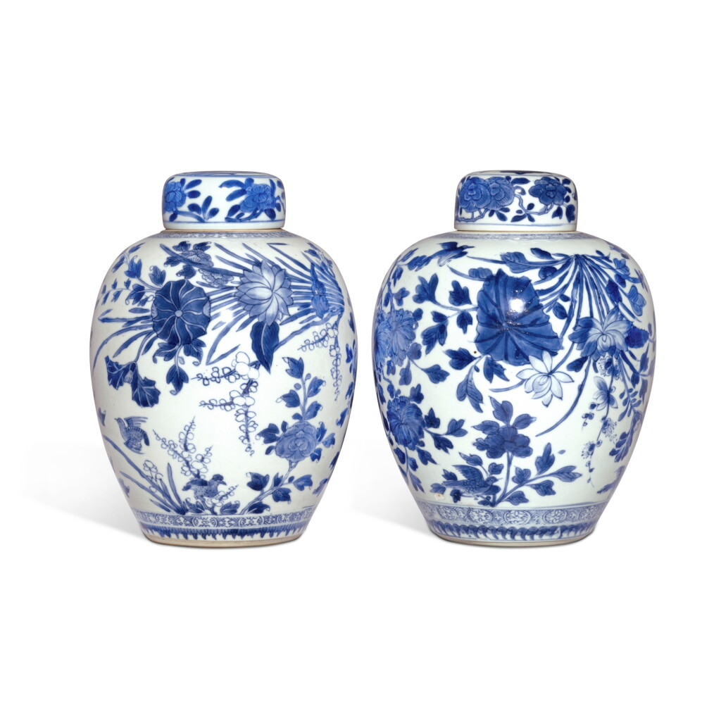 View full screen - View 1 of Lot 568. A pair of blue and white 'bird and flower' ovoid jars and covers, Qing dynasty, Kangxi period | 清康熙 青花花鳥紋蓋罐一對.