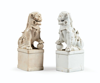 View full screen - View 1 of Lot 45. TWO BLANC DE CHINE BUDDHIST LIONS | DEUX CHIENS DE FÔ EN BLANC DE CHINE.