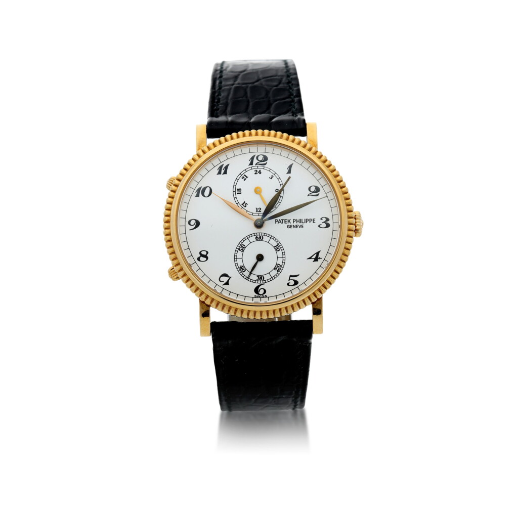 View full screen - View 1 of Lot 38. REFERENCE 5034 TRAVEL TIME A YELLOW GOLD DUAL TIME WRISTWATCH WITH 24 HOUR INDICATION, MADE IN 1997.
