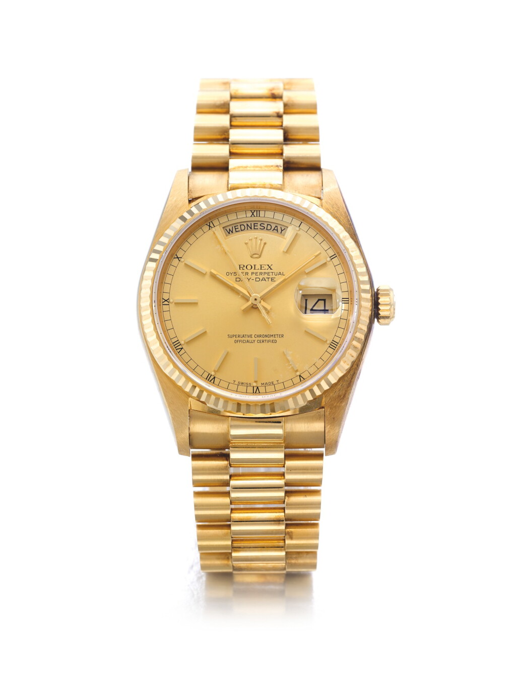 View full screen - View 1 of Lot 55. ROLEX | REF 18038 DAY-DATE, A YELLOW GOLD AUTOMATIC CENTER SECONDS WRISTWATCH WITH DAY DATE AND BRACELET CIRCA 1984.