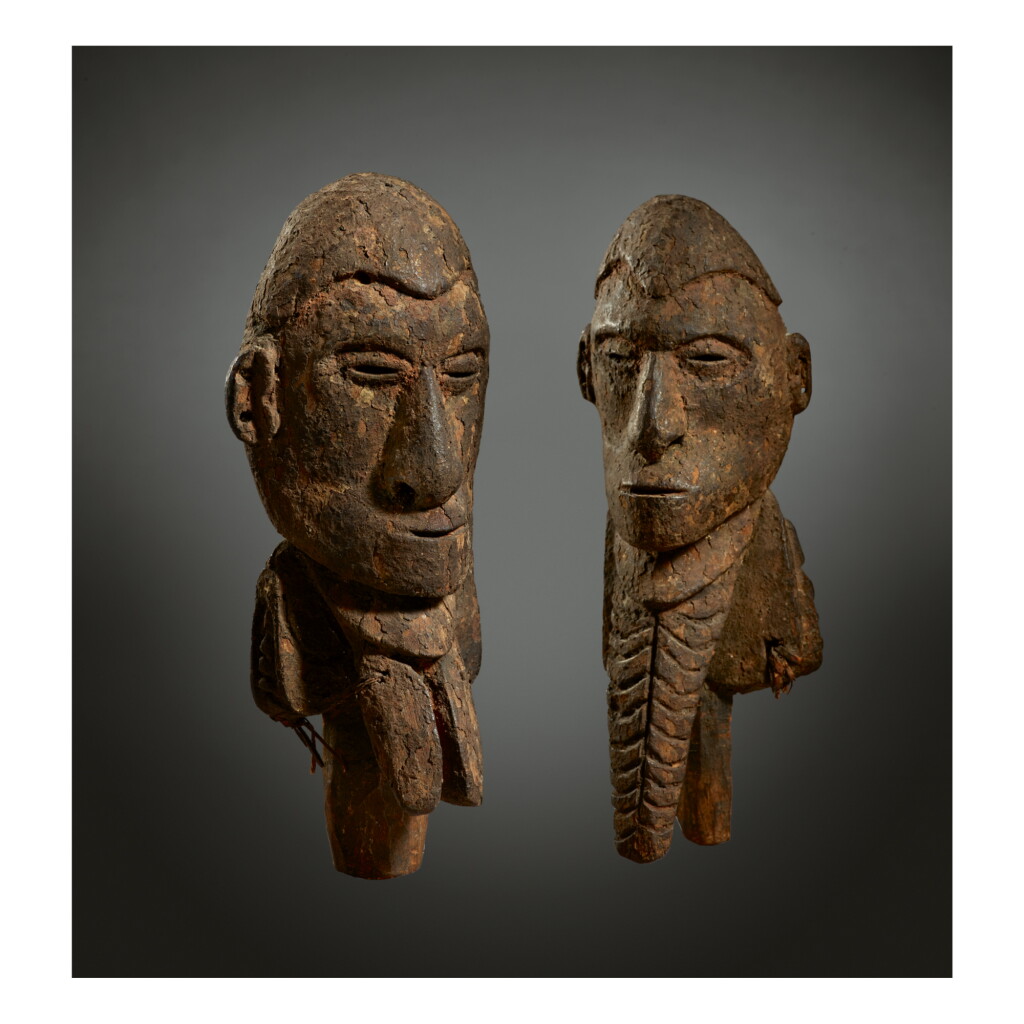 View full screen - View 1 of Lot 27. PAIR OF SACRED FLUTE FIGURES, PROBABLY SAWOS OR IATMUL.