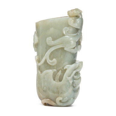 View full screen - View 1 of Lot 743. A celadon and russet jade 'chilong' vase (Guang), Qing dynasty | 清 青玉雕螭龍紋觥.
