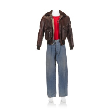 View full screen - View 1 of Lot 214. Freddie Mercury's brown leather U.S. flight jacket, worn on tour, with Levi jeans, 1980, and a red T-shirt, 1978.