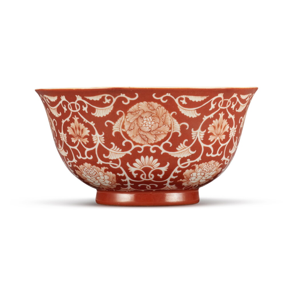 View full screen - View 1 of Lot 15. A coral-red reserve-decorated 'floral' bowl, Seal mark and period of Qianlong.