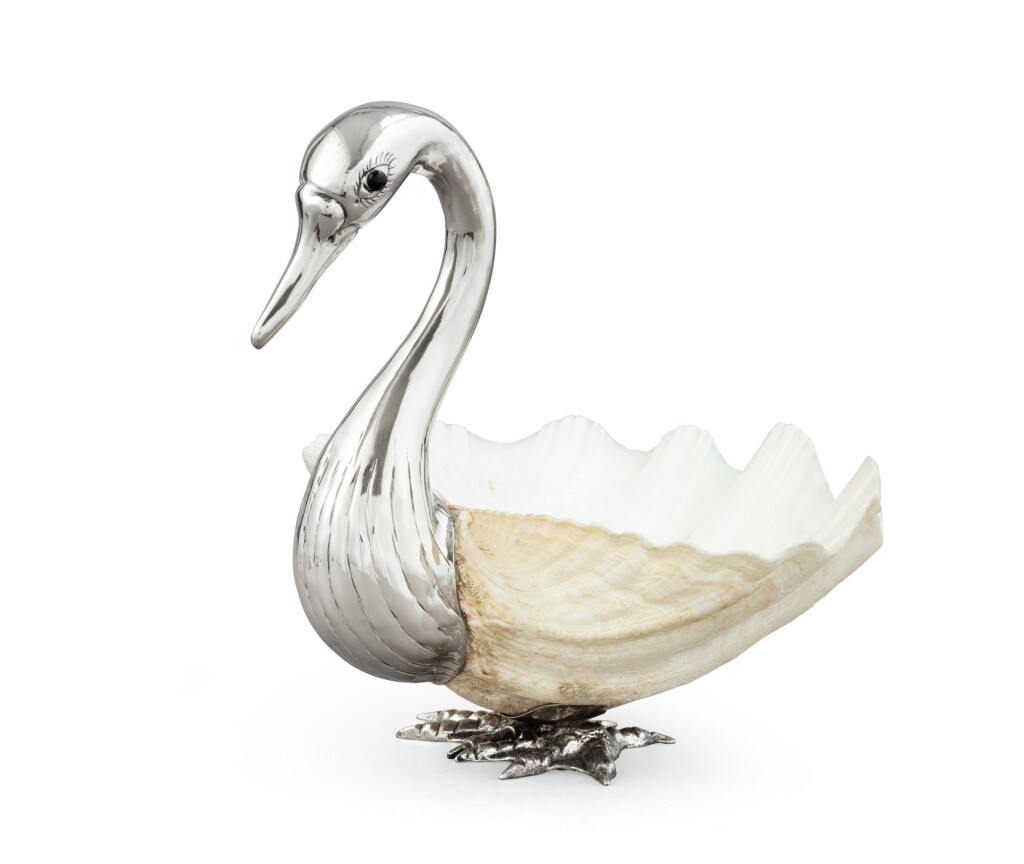 View full screen - View 1 of Lot 7. An Italian swan made of a tridachne shell with silver mounts, Buccellati, Milan, circa 1980 | Cygne formé d'un coquillage monté en argent par Buccellati, Milan, vers 1980.