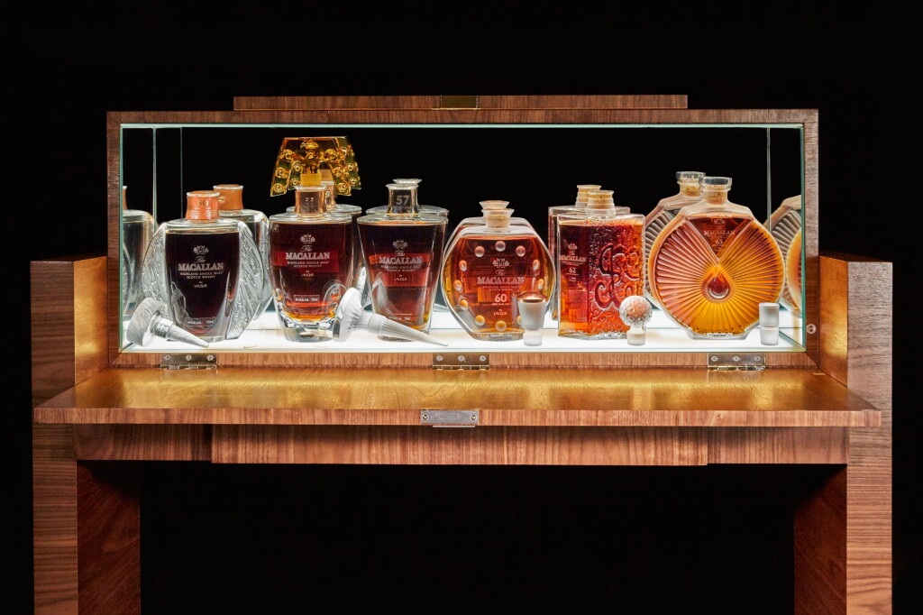 View full screen - View 1 of Lot 177. THE MACALLAN IN LALIQUE SIX PILLARS COLLECTION WITH FRENCH POLISHED WALNUT CABINET BY JAMES LAYCOCK.