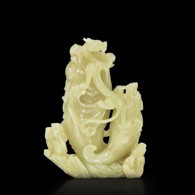 View full screen - View 1 of Lot 422. A yellow jade 'carp and dragon' double vase, Qing dynasty, 18th century 清十八世紀 黃玉魚龍形雙聯花插.