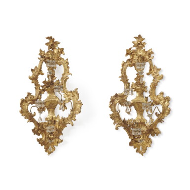 View full screen - View 1 of Lot 144. A pair of Italian giltwood angle wall-appliques, Genoa, circa 1750.