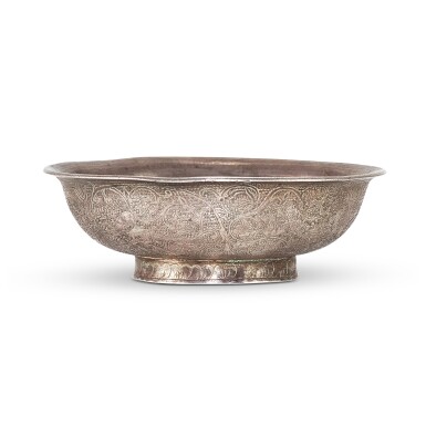 View full screen - View 1 of Lot 5007. An engraved silver 'mythical beast' bowl, Tang dynasty 唐 銀鏨穿花瑞獸紋盌.