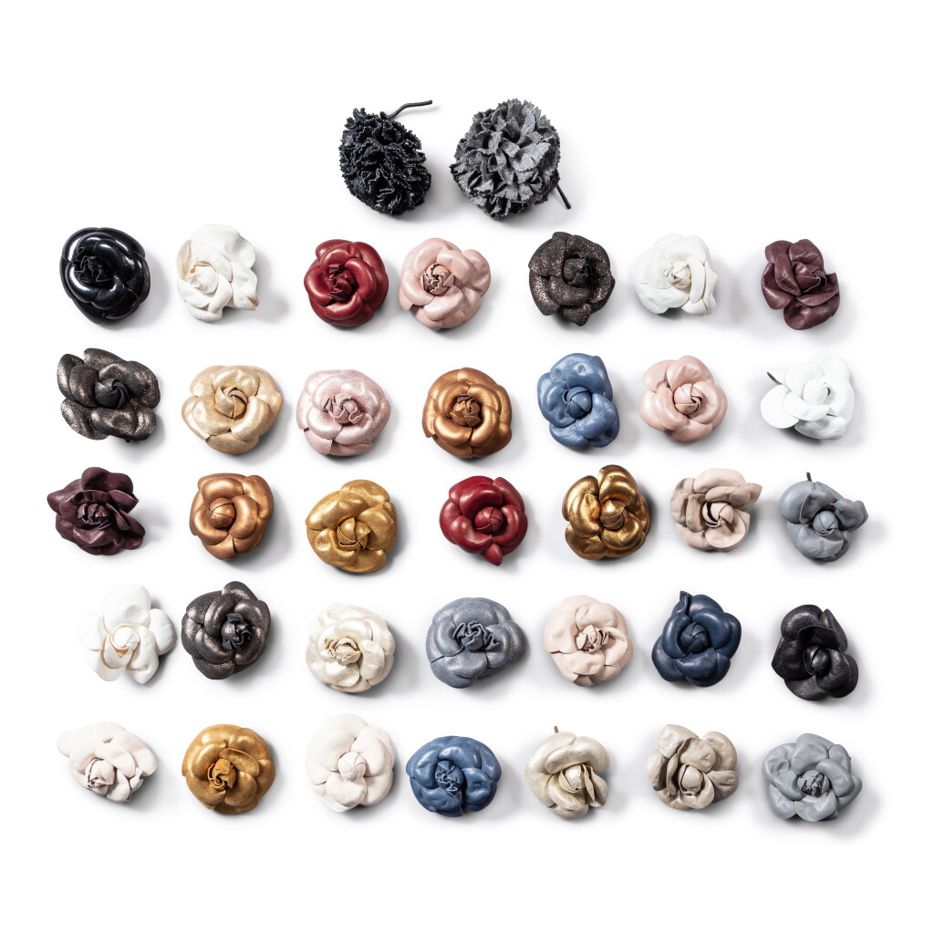 View full screen - View 1 of Lot 92. A set of thirty-five probably Chanel Camélia brooches.