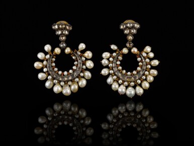 View full screen - View 1 of Lot 114. A pair of crescent-shaped pearl and diamond earrings, India, Hyderabad, late 18th century.