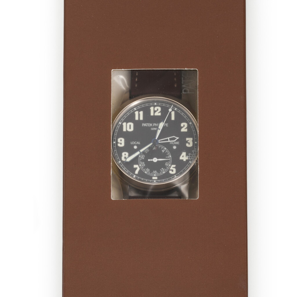 View full screen - View 1 of Lot 360. PATEK PHILIPPE | PILOT TRAVEL TIME, REF 5524G, FACTORY SEALED WHITE GOLD DUAL-TIME WRISTWATCH WITH DATE AND LOCAL DAY/NIGHT INDICATION, CIRCA 2016.