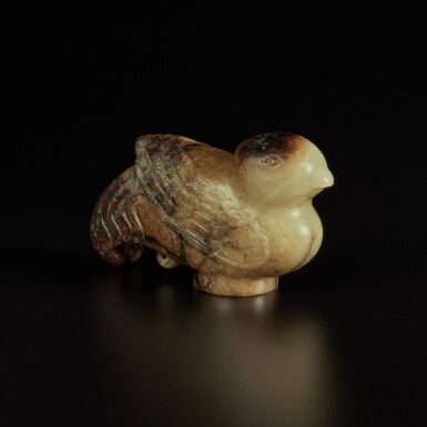 View full screen - View 1 of Lot 228. A pale celadon and brown jade bird-form staff finial, Song - Ming dynasty | 宋至明 玉鳥形杖首.