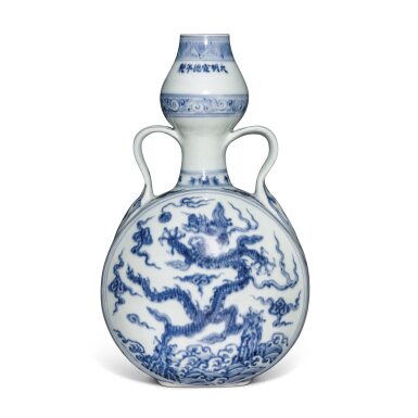 View full screen - View 1 of Lot 754. A Ming-style blue and white 'dragon' moonflask, Qing dynasty | 清 青花海水江崖雲龍戲珠紋抱月瓶.