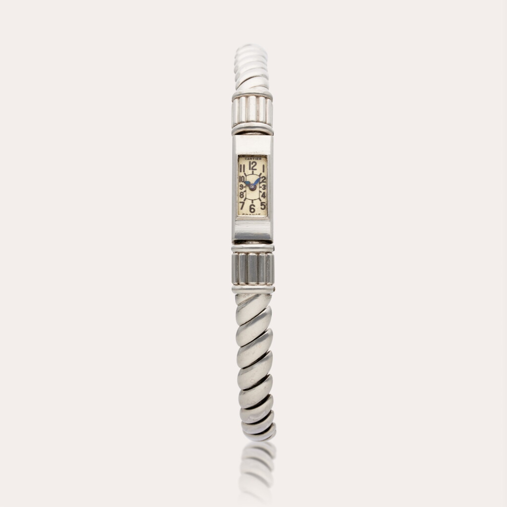 View full screen - View 1 of Lot 460. A platinum rectangular bracelet watch, Circa 1940.