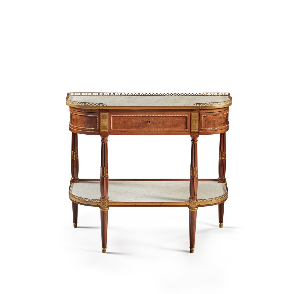 Voir en plein écran - Voir 1 du lot 649. A Louis XVI Gilt Bronze and Brass Mounted Mahogany Console Desserte by Louis Moreau, CIrca 1785.