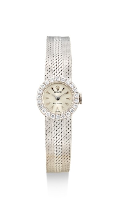 View full screen - View 1 of Lot 8022. ROLEX | LADY PRECISION, REFERENCE 2166, A WHITE GOLD AND DIAMOND-SET BRACELET WATCH, CIRCA 1968.