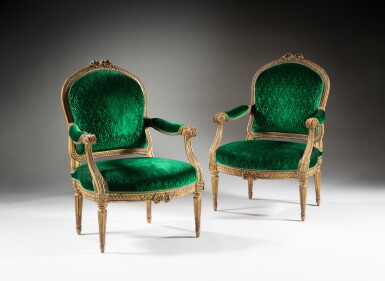 View full screen - View 1 of Lot 308. A pair of Louis XVI giltwood armchairs, stamped by Jean-Baptiste Gourdin | Paire de fauteuils en bois doré d’époque Louis XVI, estampille de Jean-Baptiste Gourdin.