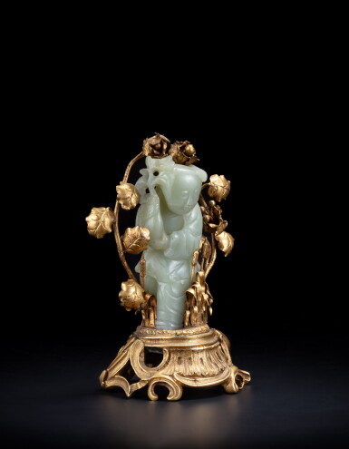 View full screen - View 1 of Lot 118. A celadon jade figure of a standing boy, Late Ming / early Qing dynasty.