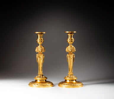 View full screen - View 1 of Lot 10. A pair of Louis XV gilt-bronze candlesticks, signed Pierre Gouthière and dated 1769 | Paire de flambeaux en bronze doré d'époque Louis XV, signée Pierre Gouthière et datée 1769.