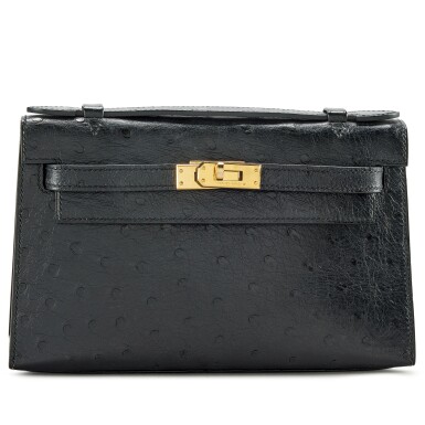 View full screen - View 1 of Lot 9. Black Ostrich Kelly Pochette Gold Hardware, 2019.