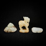 A group of three jade mythical beasts, xiezhi, Ming - Qing dynasty, 18th century 明至清十八世紀 玉雕獬豸一組三件