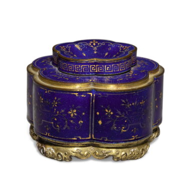 View full screen - View 1 of Lot 348. A gilt-decorated blue-ground enamel lobed inkwell and cover, Seal mark and period of Qianlong | 清乾隆 銅胎畫琺瑯藍地描金花卉紋墨水瓶 《乾隆年製》款.
