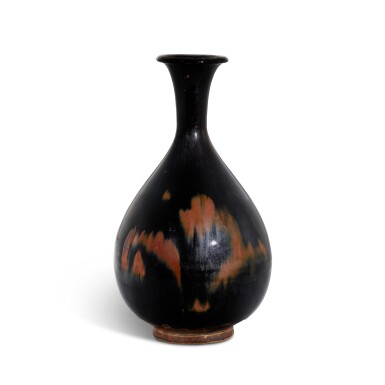 View full screen - View 1 of Lot 420. A russet-splashed black-glazed bottle vase, Yuhuchunping, Northern Song – Jin dynasty 北宋至金 黑釉褐斑玉壺春瓶.