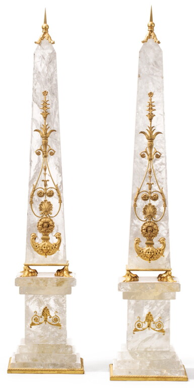 View full screen - View 1 of Lot 48. A PAIR OF GILT-BRONZE-MOUNTED ROCK CRYSTAL OBELISKS IN FRENCH RESTAURATION STYLE | PAIRE D'OBÉLISQUES EN CRISTAL DE ROCHE ET MONTURE DE BRONZE DORÉ SUR LEUR SOCLE, DE STYLE RESTAURATION.