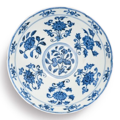 View full screen - View 1 of Lot 131. A finely painted blue and white lobed 'fruit and flower' bowl, Xuande mark and period | 明宣德 青花折枝花果紋葵口碗 《大明宣德年製》款.