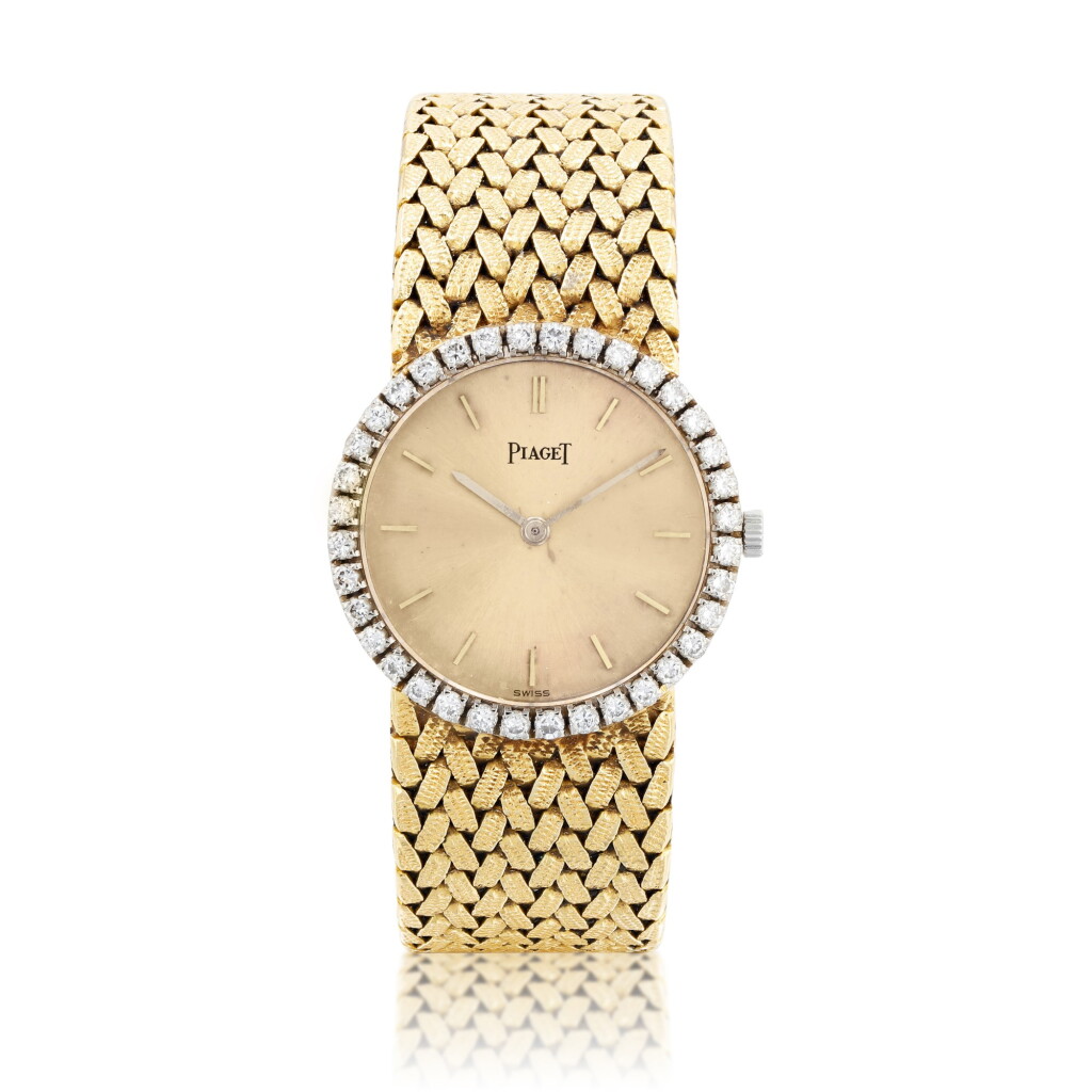 View full screen - View 1 of Lot 761. Piaget | Montre bracelet de dame en or et diamants | Lady's gold and diamond bracelet watch.