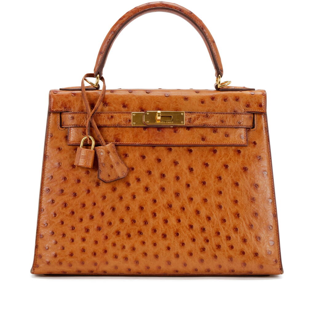 View full screen - View 1 of Lot 37. Cognac Ostrich Kelly 28 Sellier Gold Hardware, 1985.