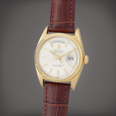 View full screen - View 1 of Lot 130. Day-Date, Reference 1803 | A yellow gold wristwatch with day and date | Circa 1972 .