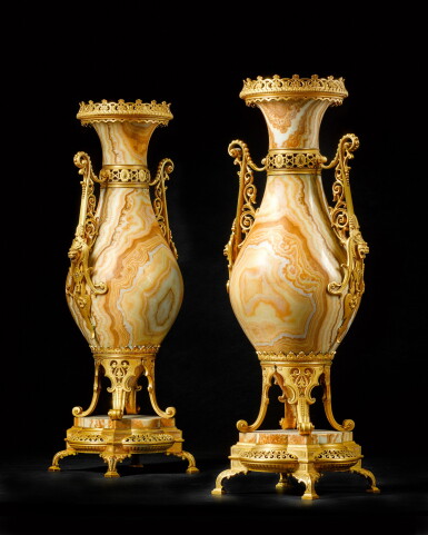 View full screen - View 1 of Lot 89. A pair of Napoleon III neo-grec gilt-bronze mounted onyx vases, circa 1870, attributed to Ferdinand Barbedienne.
