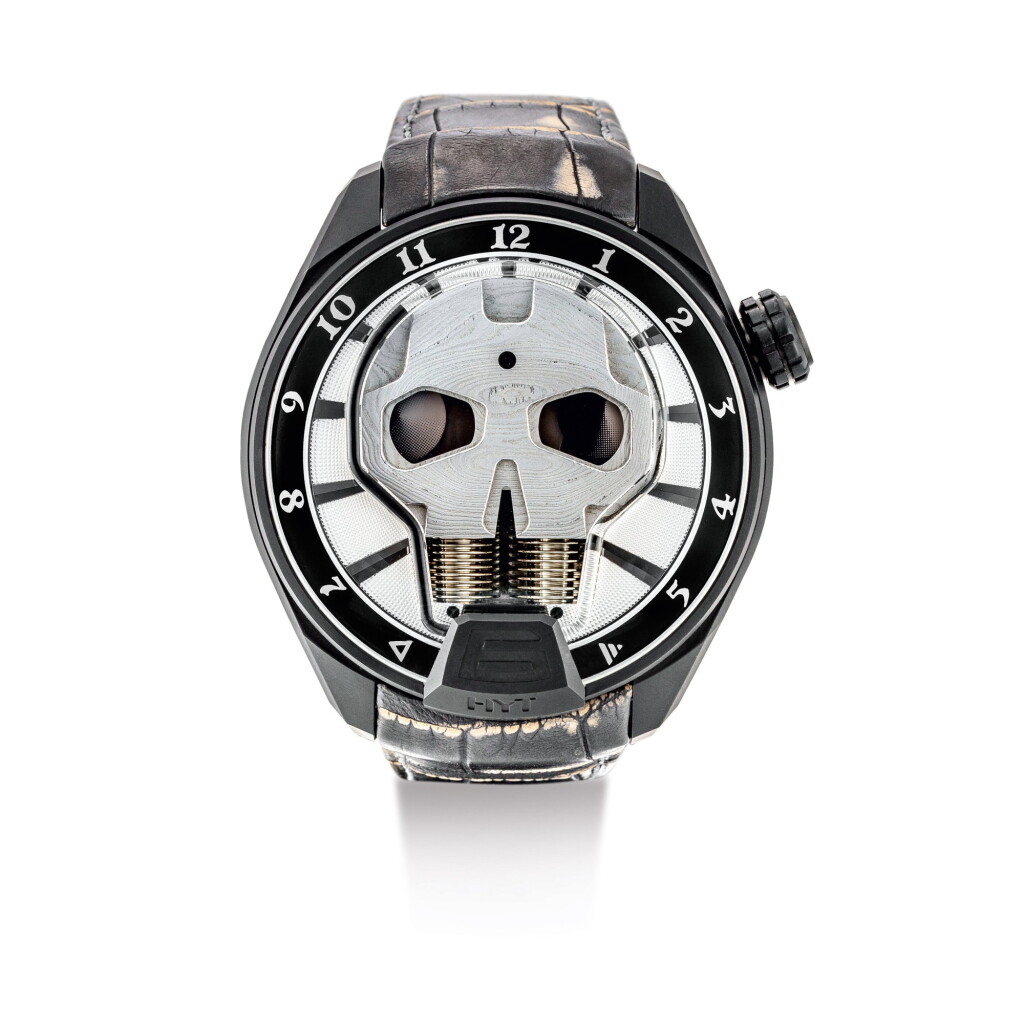 View full screen - View 1 of Lot 2173. HYT | SKULL BAD BOY, REFERENCE 151-DL-43-NF-AS, A LIMITED EDITION DLC-COATED TITANIUM WRISTWATCH WITH RETROGRADE FLUID HOURS AND POWER RESERVE INDICATION, CIRCA 2016 | "Skull Bad Boy 型號151-DL-43-NF-AS 限量版DLC塗層鈦金屬腕錶,備逆跳液體小時及動力儲備顯示,錶殼編號511106,約2016年製".