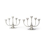 A PAIR OF DANISH SILVER FIVE-LIGHT CANDELABRA, NO. 537A, DESIGNED BY HARALD NIELSEN, GEORG JENSEN SILVERSMITHY, COPENHAGEN, CIRCA 1933-44