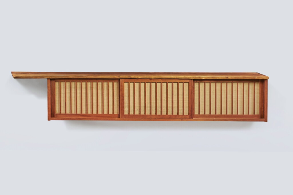 View full screen - View 1 of Lot 93. George Nakashima, Triple Sliding Door Wall Cabinet.