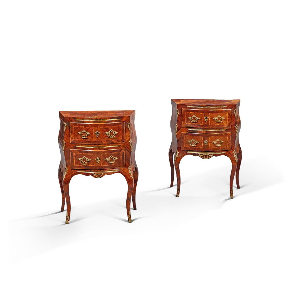 View full screen - View 1 of Lot 660. A pair of Italian gilt-bronze-mounted tulipwood, amaranth, satinwood and rosewood commodes, probably Sicily, circa 1760.
