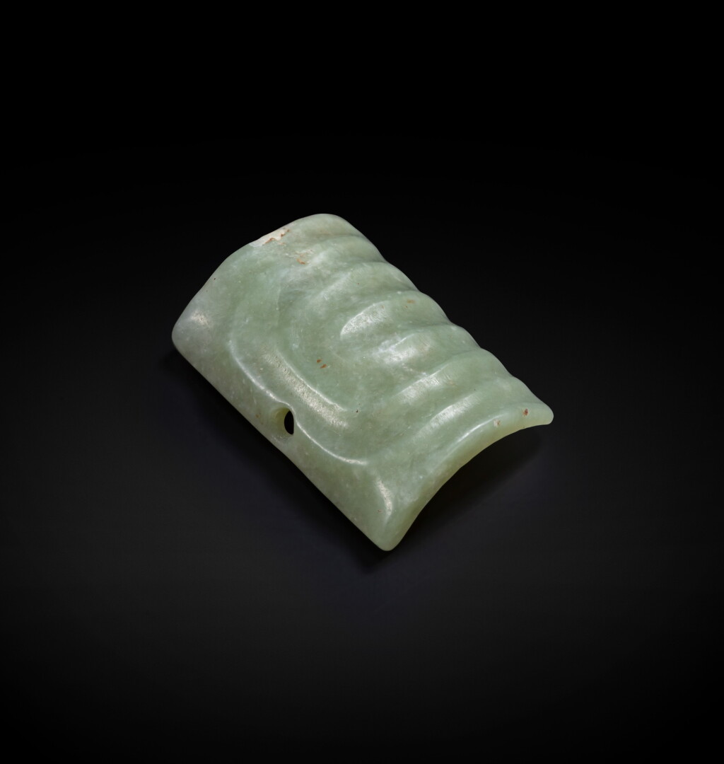 View full screen - View 1 of Lot 81. A superbly carved celadon jade ornament Neolithic period, Hongshan culture | 新石器時代 紅山文化青白玉飾.
