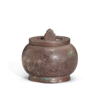 View full screen - View 1 of Lot 5009. An engraved silver tea caddy and cover, Late Tang dynasty 唐末 銀鏨花卉紋茶罐.