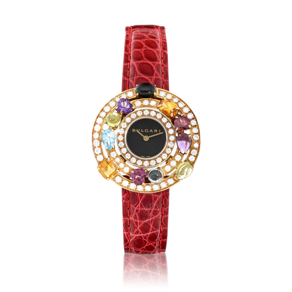 View full screen - View 1 of Lot 9271. Bvlgari | Astrale, Reference AE 36G, A pink gold, diamond, and multi gem-set wristwatch, Circa 2006 | 寶格麗 | Astrale 型號AE 36G 粉紅金鑲鑽石及多彩寶石腕錶,約2006年製.