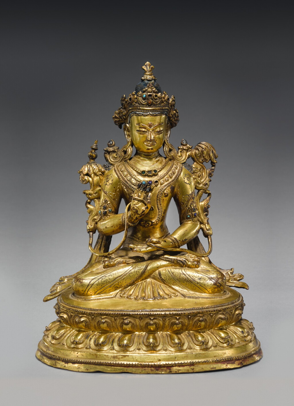 View full screen - View 1 of Lot 325. A GILT COPPER ALLOY FIGURE OF MAITREYA, TIBET, 14TH/15TH CENTURY.