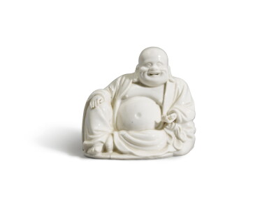View full screen - View 1 of Lot 62. A Dehua figure of Budai, Qing dynasty, 18th century | 清十八世紀 德化白瓷布袋坐像.