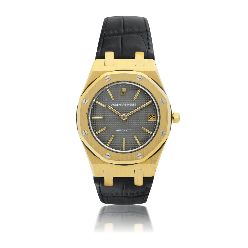 View full screen - View 1 of Lot 7. AUDEMARS PIGUET | REF. MTA000547.00 4100BA ROYAL OAK A YELLOW GOLD AUTOMATIC WRISTWATCH WITH DATE, CIRCA 1990.