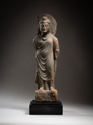 View full screen - View 1 of Lot 159. A grey schist figure of a Buddha, Ancient region of Gandhara, 2nd - 3th century | 犍陀羅 三至三世紀 灰片岩雕釋迦牟尼佛立像.